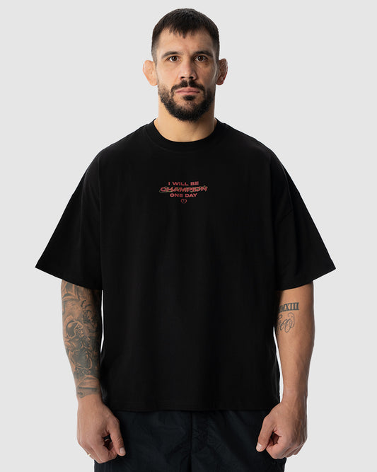 Aleksandar Rakic trägt das schwarze JUST DSRPT Premium Champion Shirt