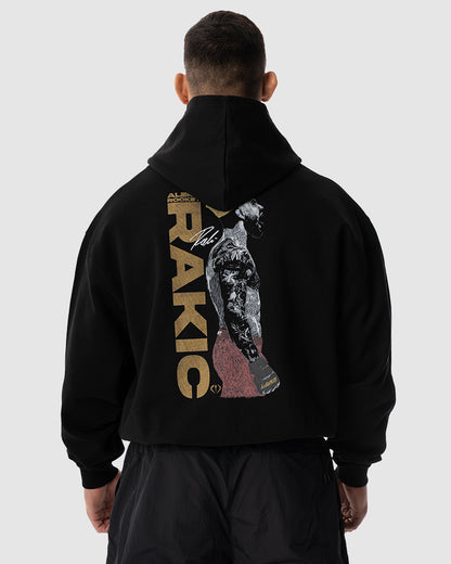 Aleksandar Rakic trägt das schwarze JUST DSRPT Premium King Hoodie