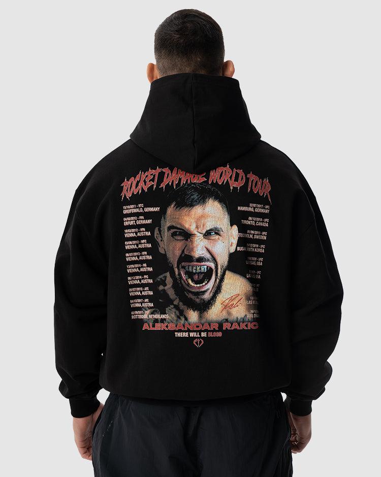 Aleksandar Rakic trägt das schwarze JUST DSRPT Premium World Tour Hoodie